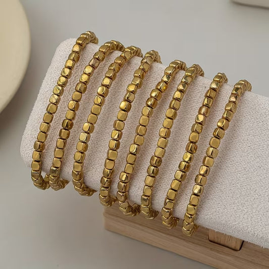 Pulsera elástica dorada BÉLINE