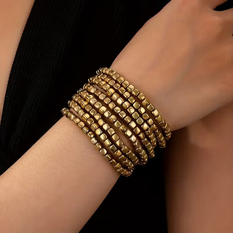 Pulsera elástica dorada BÉLINE