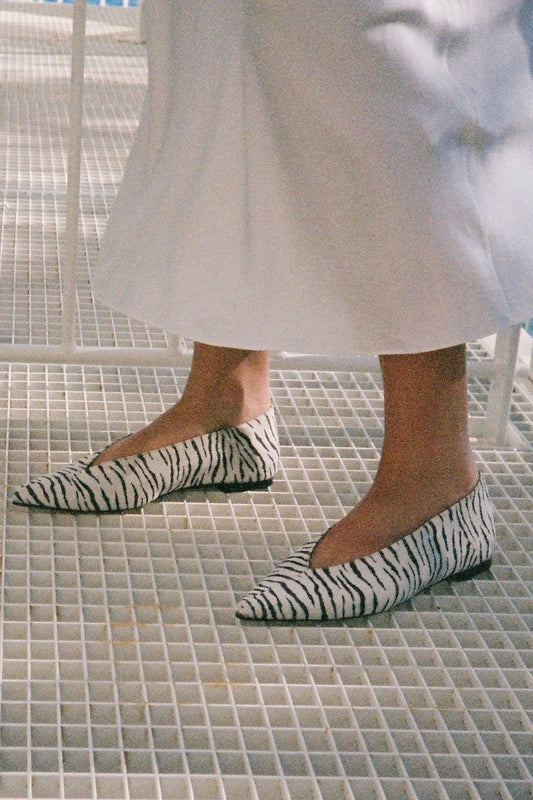 Bailarinas de piel de becerro estampado cebra
