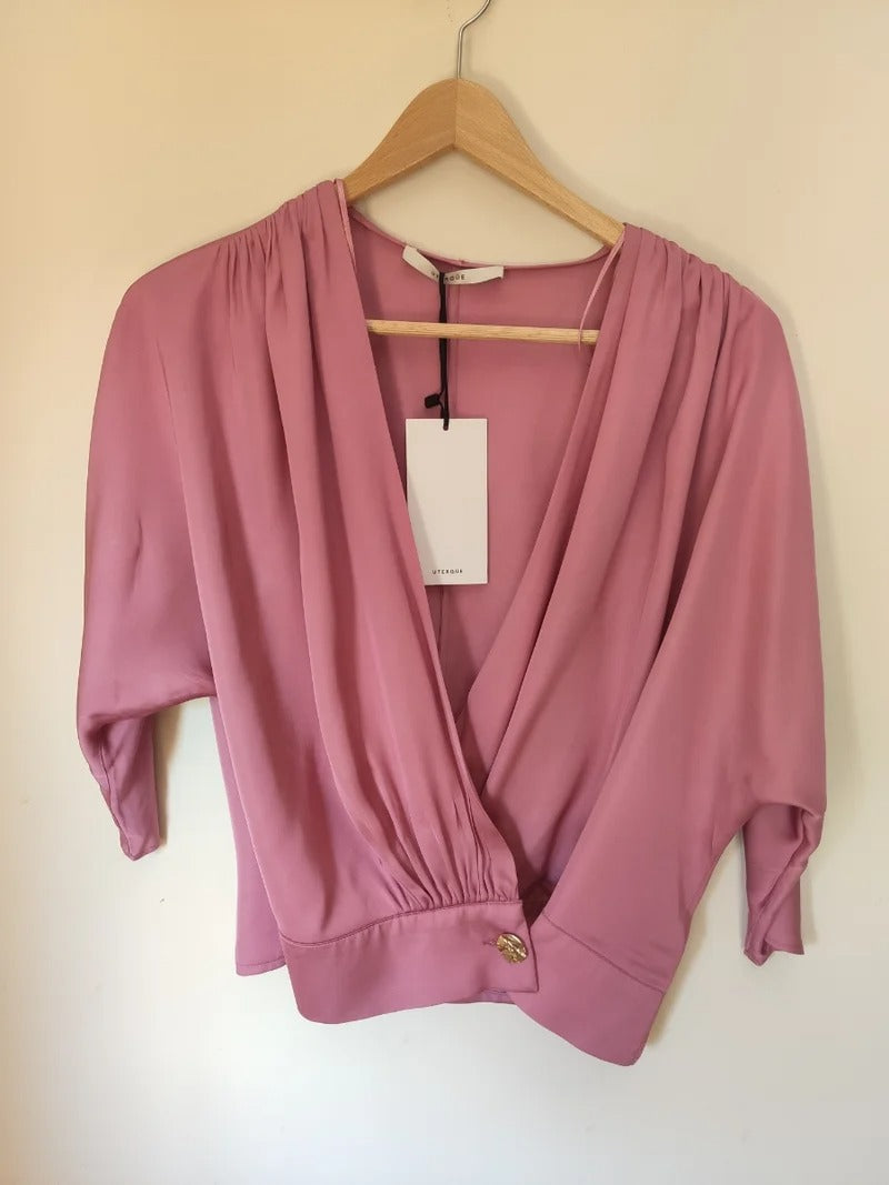 Blusa rosa de Uterqüe